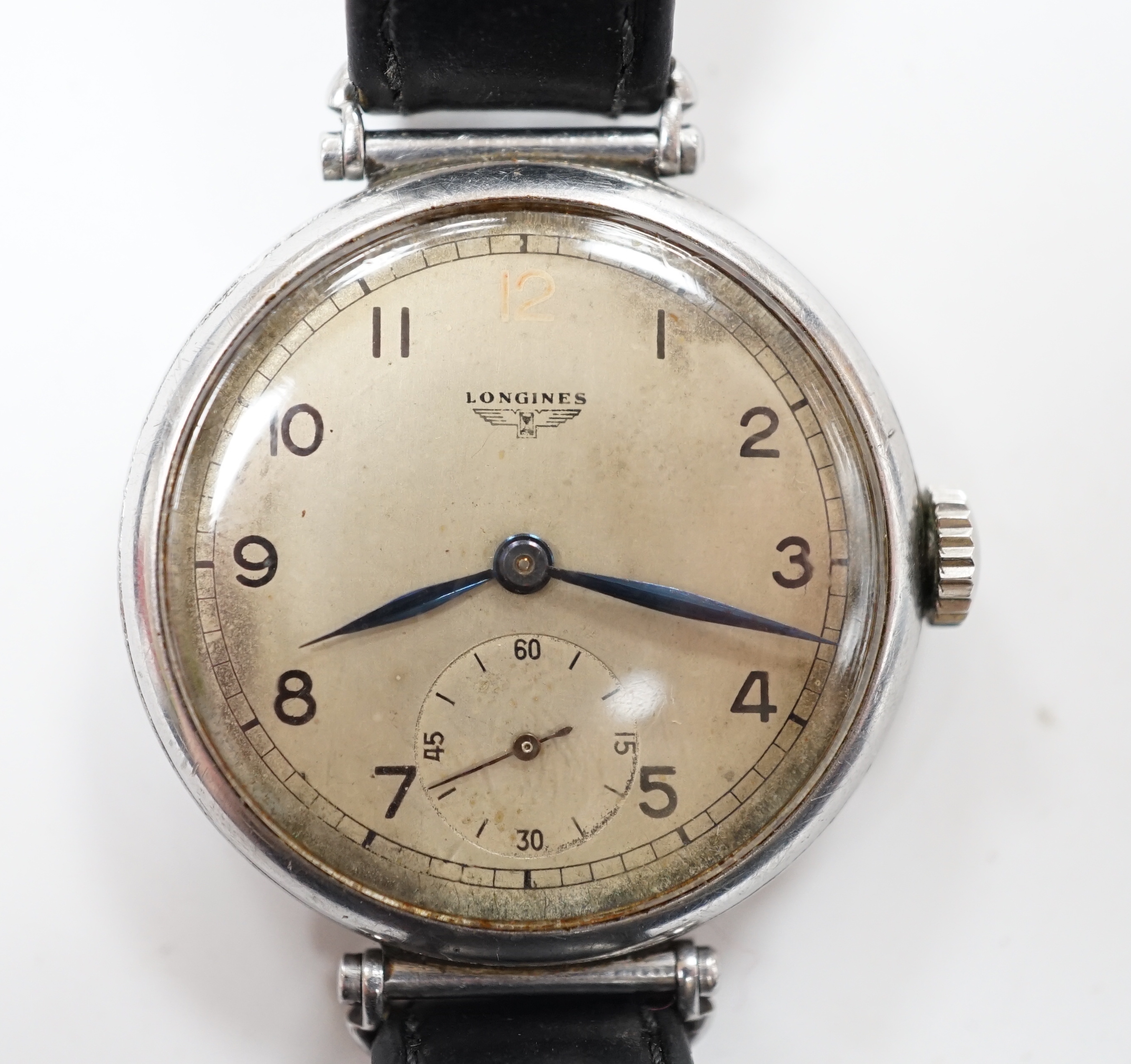 A gentleman's 1930's stainless steel Longines manual wind wrist watch, with Arabic dial and subsidiary seconds, movement c. 2.68Z, on a black leather strap.